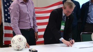 Dr Jim Whitehead, ACSM President, signs the MOU